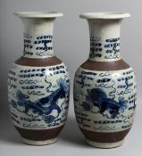 A PAIR OF CHINESE BLUE AND WHITE DRAGON CRACKLE GLAZE VASES.
