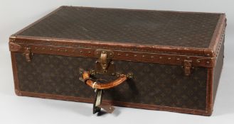 A VERY GOOD LOUIS VUITTON SUITCASE. No. 980532, with inside tray. Brass lock no. 1084879. 31ins long