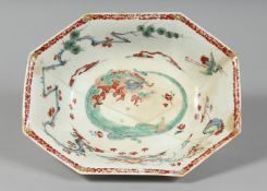A VERY RARE BOW DRAGON PATTERN DISH painted with two crane-like birds in Kakiemon style, in need