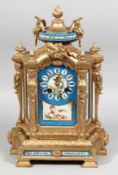 A GOOD 19TH CENTURY FRENCH GILT METAL AND SEVRES PORCELAIN PANEL CLOCK with blue dial painted with a