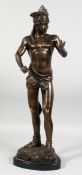 ANDRE PAUL ARTHUR MASSOULLE (FRENCH) 1851 - 1901. A BRONZE STANDING FIGURE OF A YOUNG MAN, on a