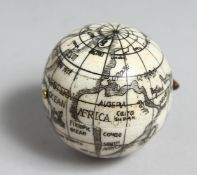 A BONE COMPASS, 1.25ins diameter.