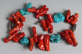A BIG AND HEAVY CORAL AND TURQUOISE NECKLACE. 20ins long.