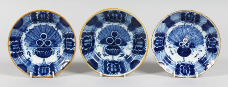 THREE SMALL 19TH CENTURY BLUE TIN GLAZE PLATES. 6ins diameter.