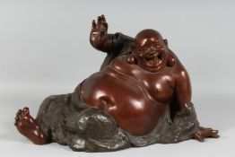 A VERY GOOD LARGE CHINESE BRONZE BUDDHA. 2ft long.