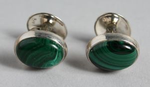 A PAIR OF SILVER AND MARCASITE CUFF LINKS.