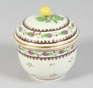 A VIENNA CIRCULAR BOWL AND COVER sprigged with cherubs. Bee hive mark in blue.