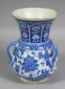 A TURKISH KUTAHYA BLUE AND WHITE POTTERY MOSQUE LAMP, painted with floral decoration, the body