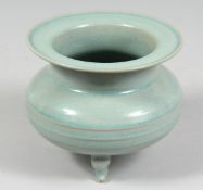 A CHINESE CELADON GLAZE RU-WARE-TYPE TRIPOD CENSER. 11cm high