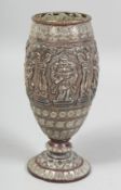 A FINE 19TH CENTURY SOUTH INDIAN TANJORE SILVER INLAID COPPER VASE, the body depicting deities, 18cm