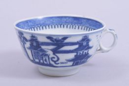 A CHINESE BLUE AND WHITE PORCELAIN TEACUP, the exterior painted with landscape scene with