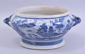 A CHINESE BLUE AND WHITE PORCELAIN TUREEN, painted with landscape scenes and with twisted vine