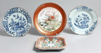 TWO CHINESE BLUE AND WHITE PORCELAIN DISHES, each painted with native flora, 22.5cm diameter,