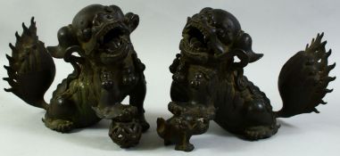 TWO LARGE 18TH CENTURY BRONZE DOGS OF FO, each approx. 21cm high, 25cm long.