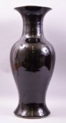 A LARGE CHINESE FAMILLE NOIR PORCELAIN VASE, 54cm high.