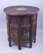 A GOOD MOORISH BONE INLAID CIRCULAR TABLE, carved with two bands of grape and vine and ornate