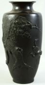 A SUPERB JAPANESE MEIJI PERIOD BRONZE RELIEF DECORATED VASE, the raised decoration depicting