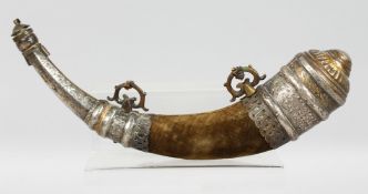 A 19TH CENTURY MOROCCAN SILVER AND BRASS MOUNTED POWDER HORN, the horn overlaid with velvet, 35cm