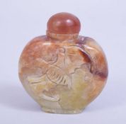A CHINESE CARVED RUSSET JADE BAT SNUFF BOTTLE, body carved with bats, 6cm high.