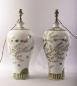 A GOOD PAIR OF CHINESE FAMILLE VERTE PORCELAIN VASE LAMPS, undrilled, painted with birds amongst