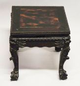 A SMALL CHINESE SQUARE FORM HARDWOOD TABLE, with carved floral frieze, supported on four curving