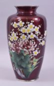 A JAPANESE RED ENAMELLED CLOISONNE VASE, the body foil with transparent red enamel overlay and