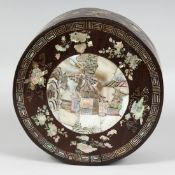 A CHINESE MOTHER OF PEARL INLAID HARDWOOD CIRCULAR BOX, the lid with central mother of pearl panel