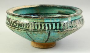 AN PERSIAN SAFAVID TURQUOISE AND LUSTRE GLAZE POTTERY BOWL, the interior with foliate motif. 21.