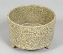 A CHINESE CRACKLE GLAZE TRIPOD CENSER, 12cm diameter.