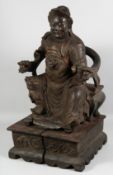 A SUPERB LARGE CHINESE CARVED WOOD STATUE of a seated dignitary, mounted to a wooden base, the