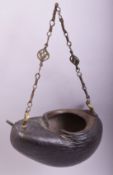 A SUPERB LARGE 19TH CENTURY COCO DE MER KASHKOOL, fitted with metal chain, 28cm long.