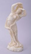 A CHINESE SOAPSTONE CARVING OF A FEMALE FIGURE, 20cm high.