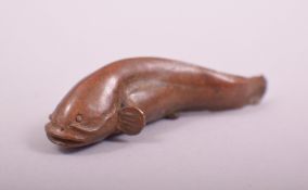 A JAPANESE BRONZE MODEL OF A FISH, stamped underside, 6cm long.