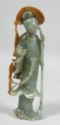 A FINE QUALITY CHINESE TWO-TONE JADE CARVING of a female figure, holding a bamboo stick with a