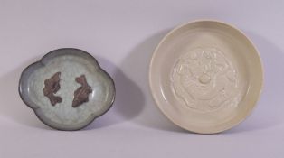 A CHINESE GE WARE TWIN FISH QUATREFOIL DISH, together with a pale green dragon brush washer, dish