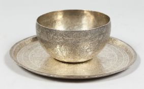 A PERSIAN QAJAR WHITE METAL BOWL AND DISH, each with engraved figural decoration, bowl 11.5cm