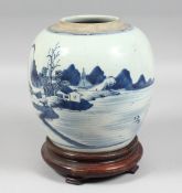 A CHINESE BLUE AND WHITE PORCELAIN JAR on a fitted hardwood stand, the body depicting a landscape