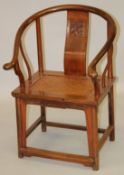 A GOOD CHINESE ELM WOOD HORSESHOE SHAPE CHAIR, with carved back splat and woven seat panel, 94cm