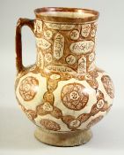 AN ISLAMIC KASHAN GLAZED POTTERY JUG, the neck painted with Qur'anic cartouches, the inner neck with