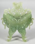 AN UNUSUAL CHINESE CARVED JADE BUTTERFLY-FORMED BOX AND COVER, with twin ring handles and raised