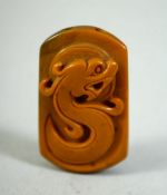 A CHINESE CARVED CORNELIAN PENDANT, 4cm.