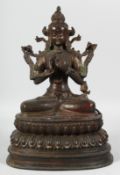 A GOOD LARGE BRONZE SEATED DEITY on a lotus base. 35cm high