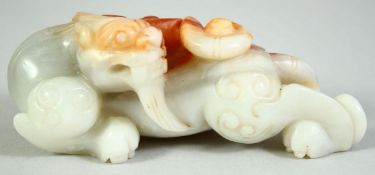 A CHINESE CARVED JADE FIGURE of a chilong dragon, 11cm long.