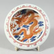 A SMALL CHINESE FAMILLE ROSE PORCELAIN BRUSH WASHER, the interior painted with dragon amongst