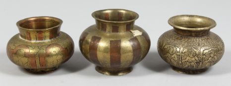 THREE SMALL 18TH CENTURY SOUTH INDIAN COPPER AND BRASS LOTA VESSELS, (3).