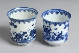 A NEAR-PAIR OF JAPANESE HIRADO BLUE AND WHITE PORCELAIN CUPS, each decorated with boys playing in