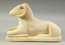 A CARVED STONE RECUMBENT RAM, possibly Egyptian, 26.5cm long