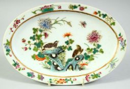 A SMALL CHINESE FAMILLE ROSE OVAL SHAPE PORCELAIN DISH, painted with birds and native flora, six