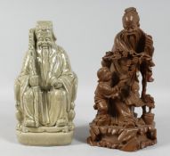 A CHINESE CELADON GLAZE PORCELAIN FIGURE OF A SEATED MALE FIGURE, 27cm high, together with a