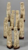 EIGHT CHINESE CARVED BONE FIGURES OF THE EIGHT IMMORTALS, each mounted to a hardwood base. Each